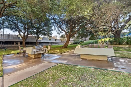 view of property's community featuring a patio area