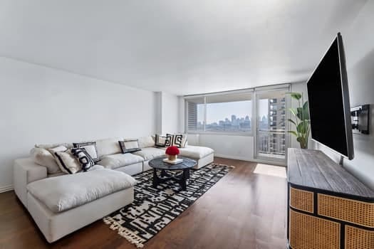 living room featuring dark hardwood / wood-style flooring