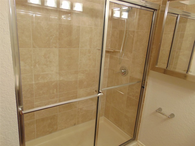 bathroom with an enclosed shower