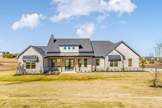 rear view of property featuring a porch