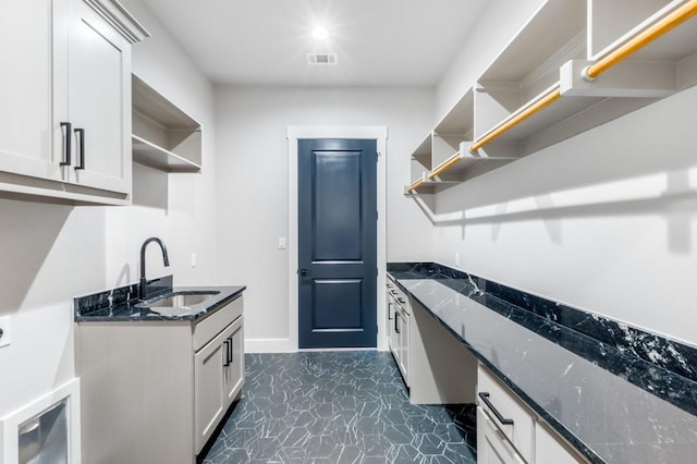 laundry area with sink