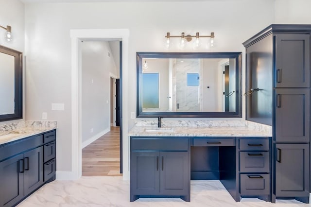 bathroom with vanity and walk in shower