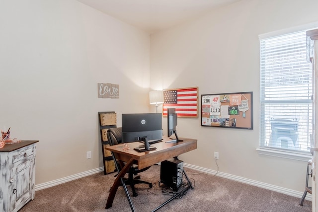 home office featuring carpet floors and a wealth of natural light