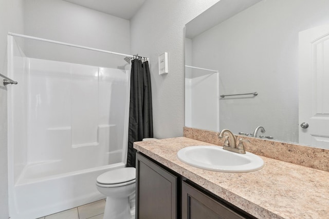 full bathroom featuring tile patterned flooring, vanity, toilet, and shower / tub combo with curtain