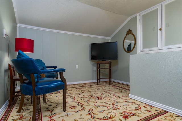 living area featuring lofted ceiling, crown molding, and a textured ceiling