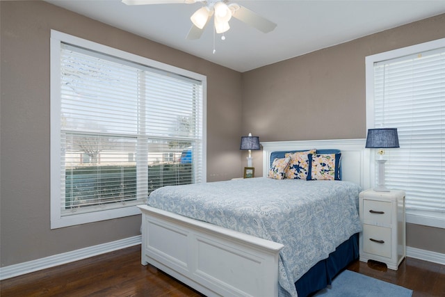 bedroom featuring ceiling fan and dark hardwood / wood-style floors