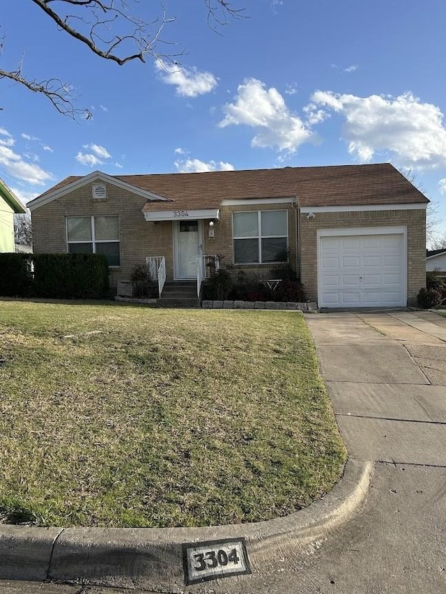 single story home featuring brick siding, a garage, concrete driveway, and a front lawn