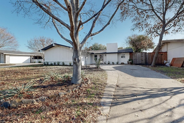 single story home with a garage