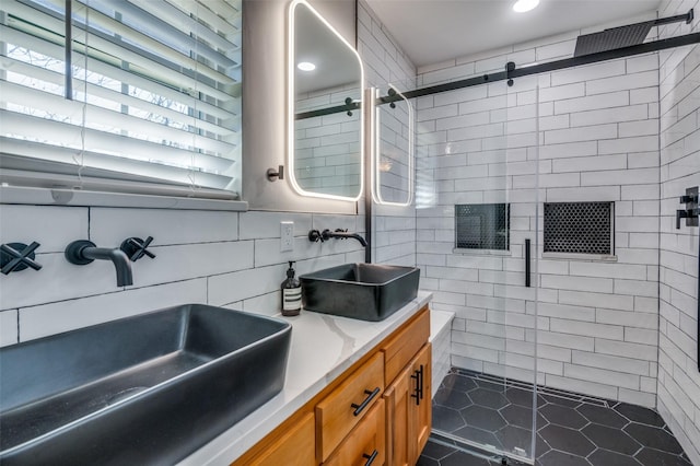 bathroom featuring vanity, tile patterned floors, and a shower with shower door