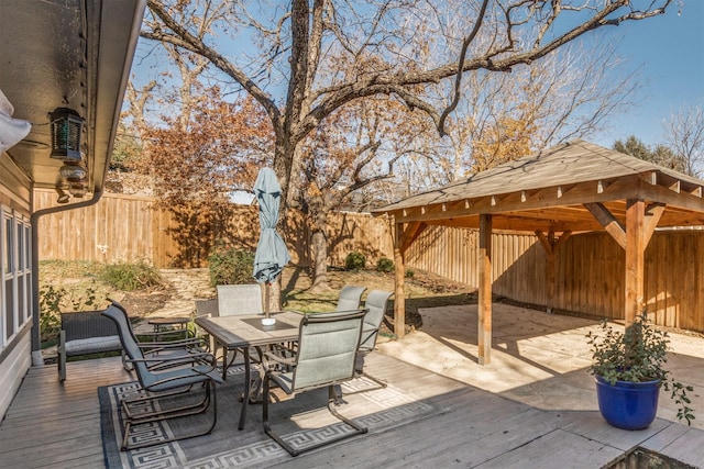 wooden deck featuring a gazebo