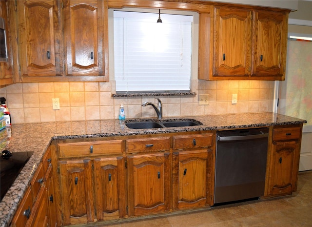 kitchen with stone counters, dishwasher, sink, and black electric cooktop