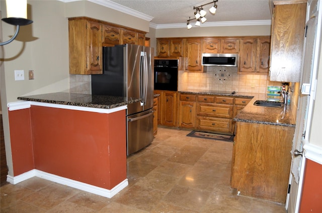 kitchen with backsplash, ornamental molding, sink, and black appliances