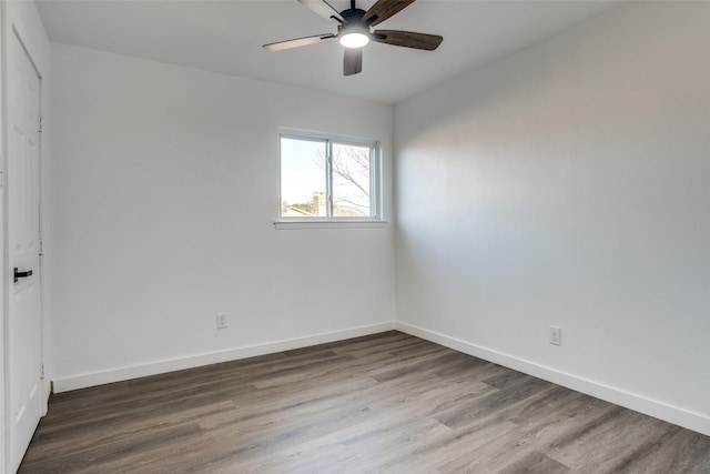 unfurnished room featuring hardwood / wood-style flooring and ceiling fan