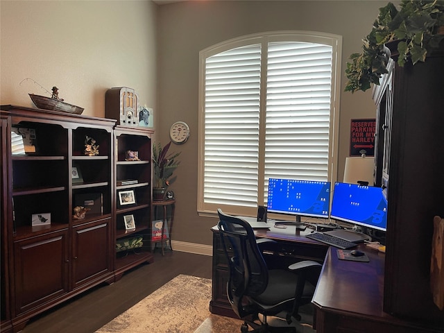 office area featuring baseboards and wood finished floors