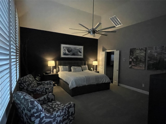 bedroom featuring carpet, vaulted ceiling, baseboards, visible vents, and a ceiling fan