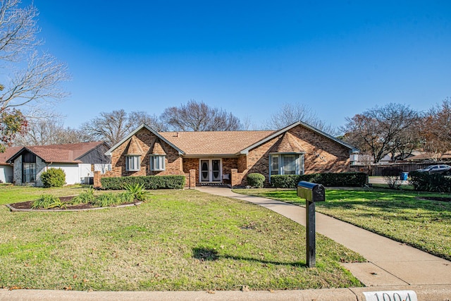 ranch-style home with a front lawn