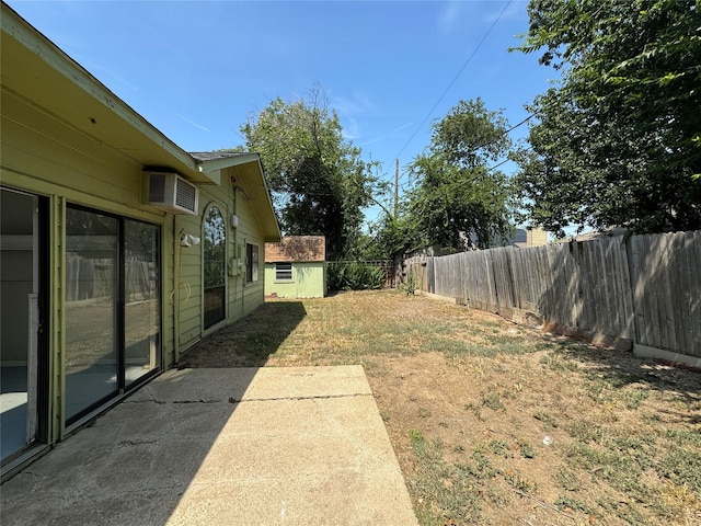 view of yard with a patio area and a shed