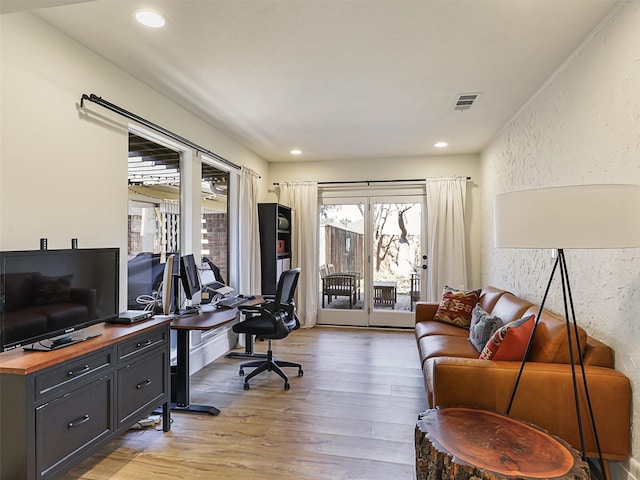 office with hardwood / wood-style flooring