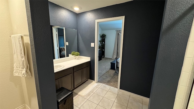 bathroom featuring vanity and tile patterned flooring