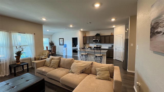 living room with dark hardwood / wood-style flooring