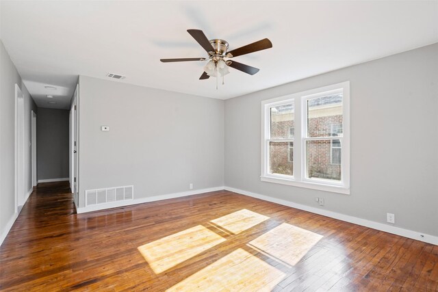 702 N Church St, Decatur, TX 76234 - unfurnished room featuring hardwood / wood-style floors and ceiling fan