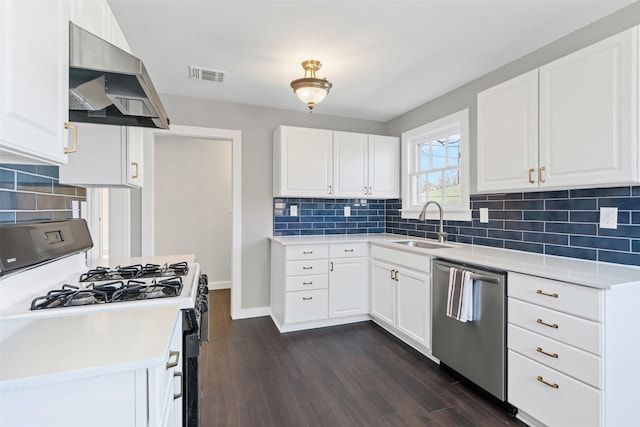 kitchen with sink, white range with gas stovetop, stainless steel dishwasher, range hood, and white cabinets