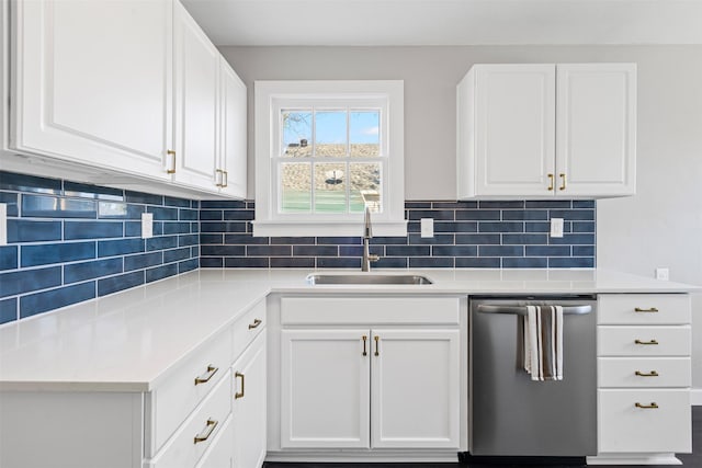 702 N Church St, Decatur, TX 76234 - kitchen with dishwasher, a sink, white cabinetry, and light countertops