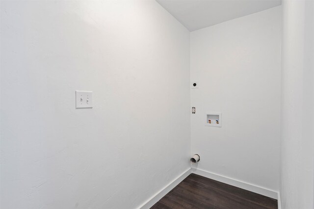 702 N Church St, Decatur, TX 76234 - laundry area featuring electric dryer hookup, dark wood finished floors, and hookup for a washing machine