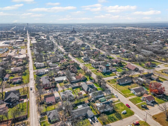702 N Church St, Decatur, TX 76234 - aerial view of property and surrounding area with nearby suburban area