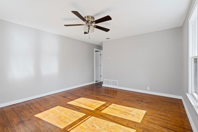 spare room featuring hardwood / wood-style flooring and ceiling fan