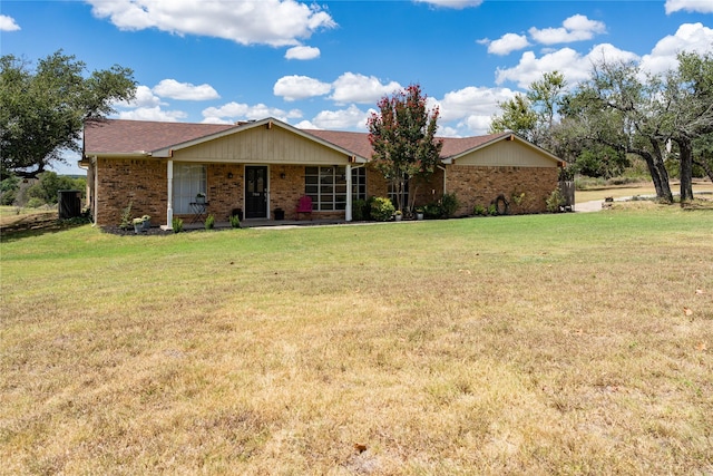 single story home featuring a front yard