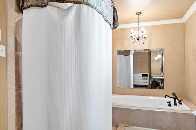 bathroom featuring tiled tub, crown molding, and a chandelier