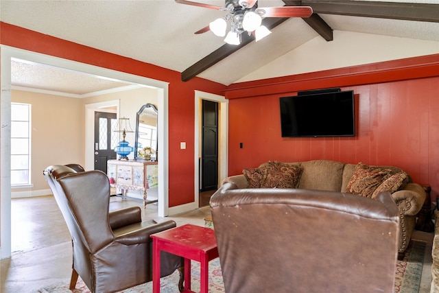 living room with lofted ceiling with beams, ceiling fan, and crown molding