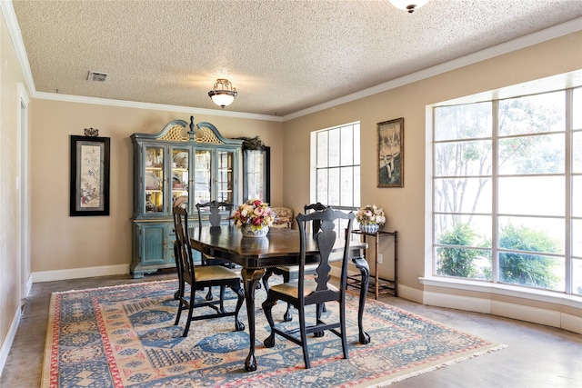 dining area featuring a textured ceiling and ornamental molding