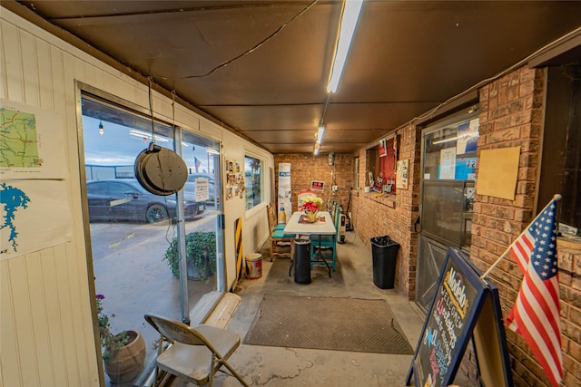 interior space with brick wall