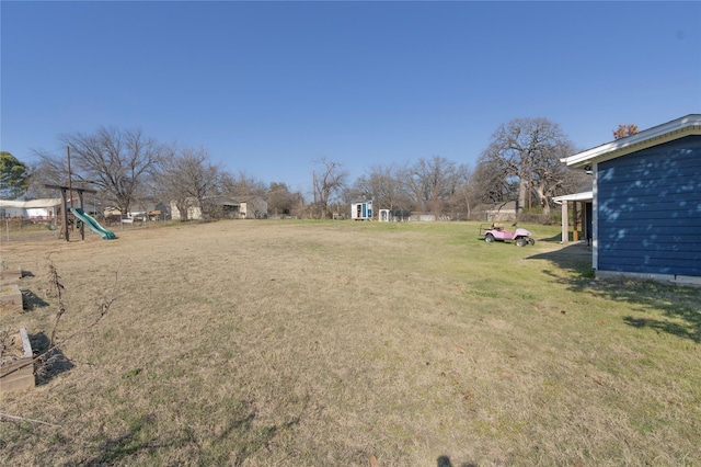 view of yard with a playground