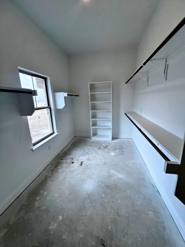 bathroom featuring concrete floors