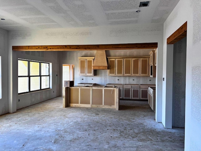 kitchen featuring premium range hood