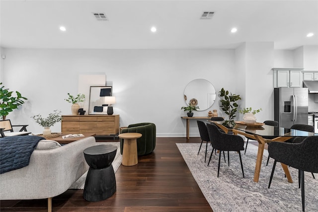 living room featuring dark wood-type flooring