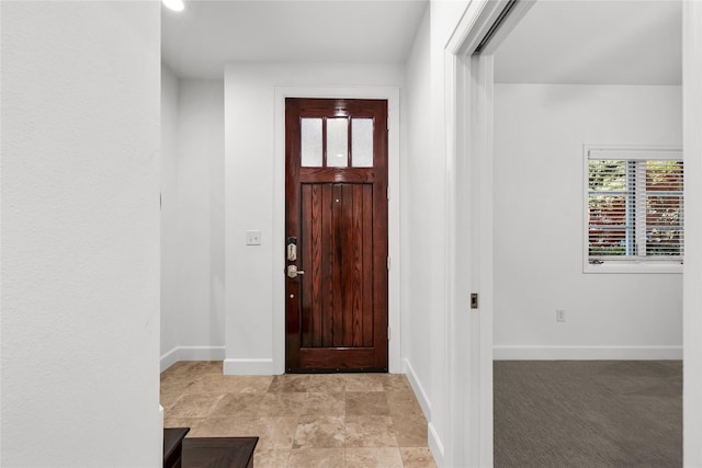 entrance foyer featuring baseboards