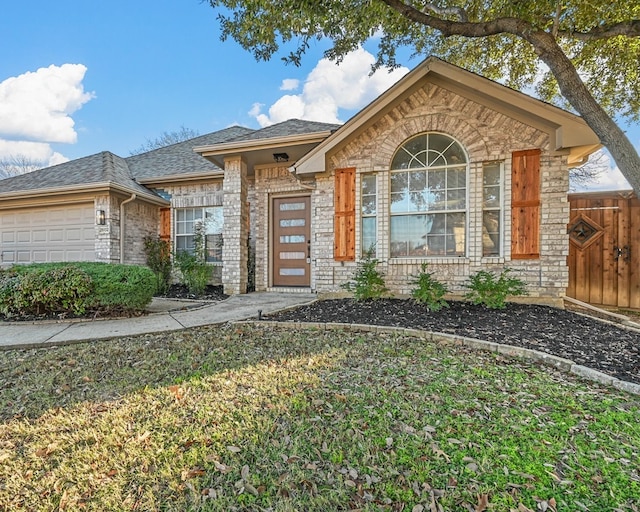 single story home with a garage