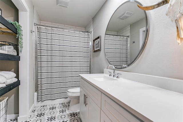 full bathroom with vanity, toilet, and shower / tub combo with curtain