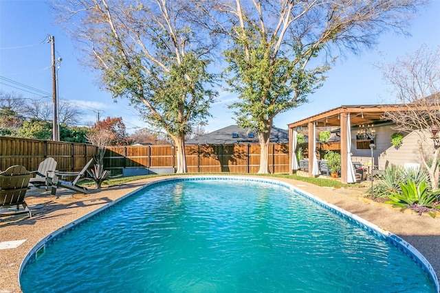 view of swimming pool featuring a patio