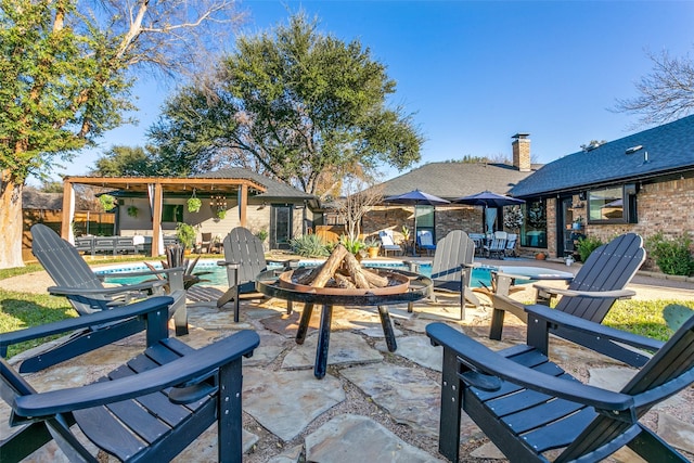 view of patio / terrace with a fenced in pool