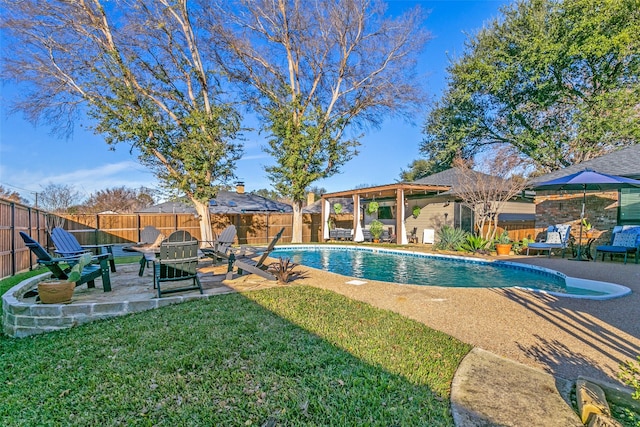 view of pool with a patio and a lawn