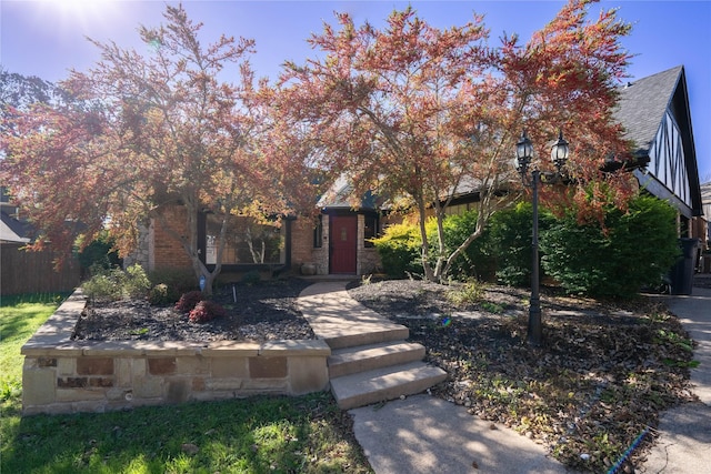 view of property hidden behind natural elements