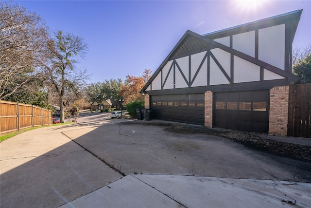 view of property exterior featuring a garage