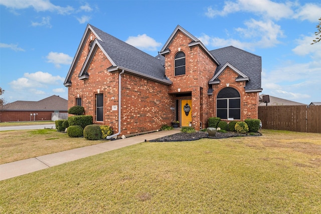 view of front property with a front lawn