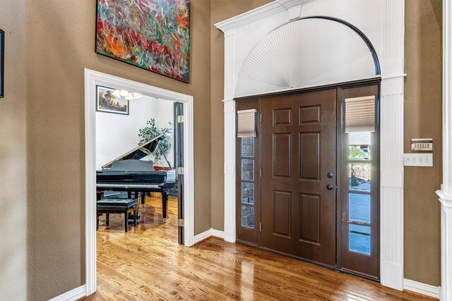 foyer with light hardwood / wood-style floors