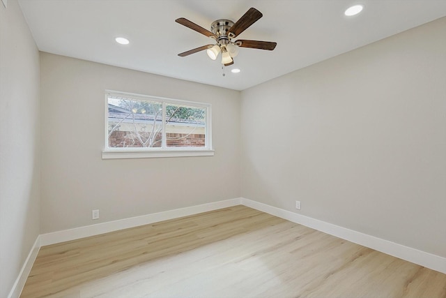 unfurnished room with ceiling fan and light hardwood / wood-style flooring